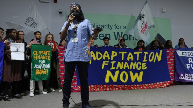 Activists demonstrate for climate adaptation financing on day eight at the UNFCCC COP29 Climate Conference on November 19, 2024, in Baku, Azerbaijan.