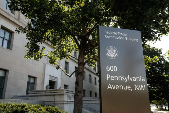 Exterior view of the street sign in front of the US Federal Trade Commission headquarters.