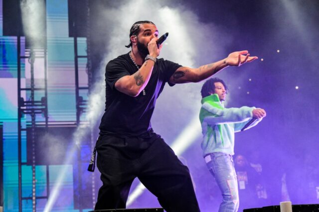 Drake and 21 Savage perform onstage on December 9, 2022 in Atlanta, Georgia.