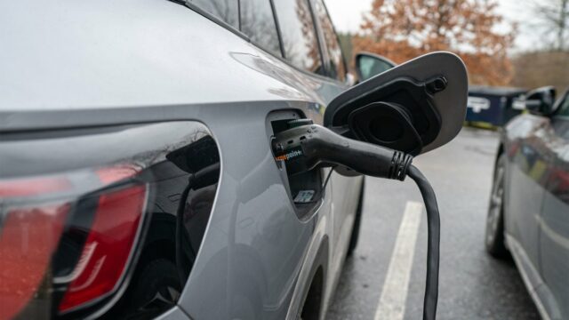 CHARLOTTE, VERMONT - NOVEMBER 13: A Volkswagen ID.4 electric car recharges its batteries November 14, 2023 at a charging station next to the town hall in Charlotte, Vermont. The average price for a VW ID.4 electric car is $45,000. (Photo by Robert Nickelsberg/Getty Images)