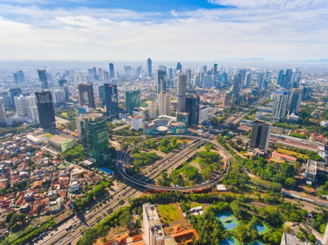 A photo of the Semanggi overpass and skyscape in Jakarta, Indonesia.