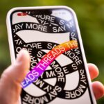 A phone is seen running the Instagram Threads app by Meta in this photo illustration.