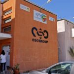 The NSO Group company logo is displayed on a wall of a building next to one of their branches in the southern Israeli Arava valley near Sapir community centre on February 8, 2022.