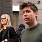 Sam Altman, chief executive officer of OpenAI, right, departs the New York Times DealBook Summit at Jazz at Lincoln Center in New York, US, on Wednesday, Dec. 4, 2024.