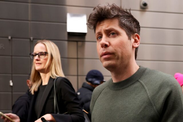 Sam Altman, chief executive officer of OpenAI, right, departs the New York Times DealBook Summit at Jazz at Lincoln Center in New York, US, on Wednesday, Dec. 4, 2024.