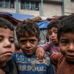 displaced children in front of makeshift tents in rafah on march 14 2024 photo afp