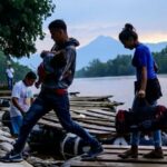 central american migrants arrive in ciudad hidalgo mexico on june 10 after crossing the suchiate river from guatemala on a makeshift raft photo afp