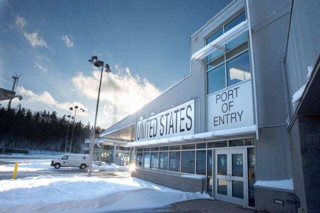 US port of entry surrounded by snow.