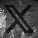 X (formerly Twitter) logo on a cracked wall