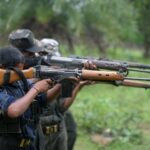 in this photograph taken on july 8 2012 indian maoists ready their weapons as they take part in a training camp in a forested area of bijapur district in the central indian state of chhattisgarh photo afp