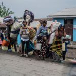 Die Bewohner fliehen Goma, als M23 Rebellen in die größte östliche Stadt der DRC eintreten