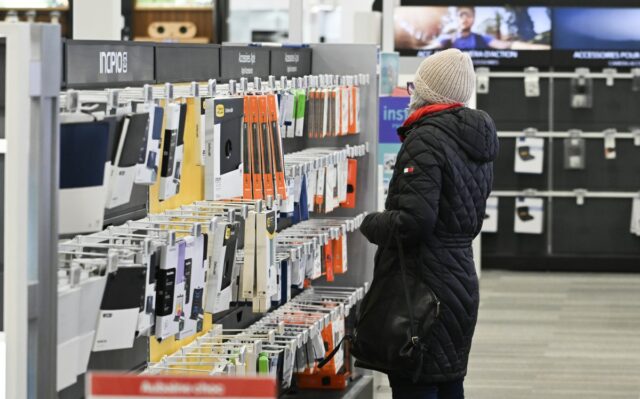 A shopper browses at a Best Buy store in Montreal, Quebec, Canada, on Friday, Jan. 19, 2024.