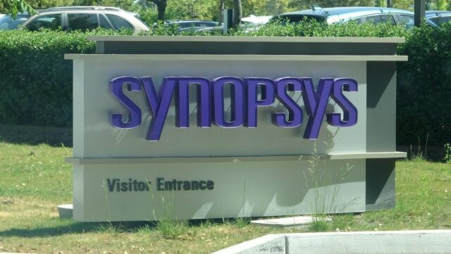 Close-up of sign with logo at Silicon Valley headquarters of technology company Synopsys, Mountain View, California.