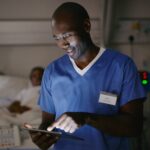 Shot of a medical practitioner using a digital tablet in a hospital ward