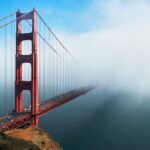 Red San Francisco Bay Bridge dissapearing in the almost always present mist in the Bay area.