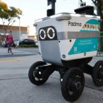 WEST HOLLYWOOD, CALIFORNIA - MARCH 19: A Serve Robotics autonomous delivery robot, which utilizes AI and is emissions-free, operates on a sidewalk on March 19, 2024 in West Hollywood, California. Several companies are operating self-driving sidewalk vehicles which deliver food and other smaller items in parts of the Los Angeles area. (Photo by Mario Tama/Getty Images)