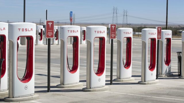 KETTLEMAN CITY, CA - JUNE 19: A deserted array of Tesla charging stations is viewed at 9 a.m. on June 19, 2024 in Kettleman City, California. Kettleman City offers fast food and an excess of Tesla electrical charging stations for travelers on Interstate 5 between Los Angeles and the San Francisco Bay Area. (Photo by George Rose/Getty Images)