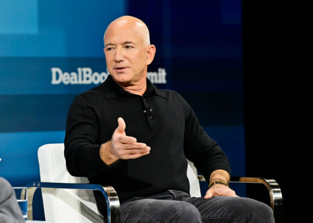 NEW YORK, NEW YORK - DECEMBER 04: Jeff Bezos speaks onstage during The New York Times Dealbook Summit 2024 at Jazz at Lincoln Center on December 04, 2024 in New York City. (Photo by Eugene Gologursky/Getty Images for The New York Times)