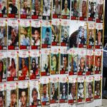 a man sits next to posters with images of hostages kidnapped in the deadly october 7 attack in tel aviv israel file photo reuters