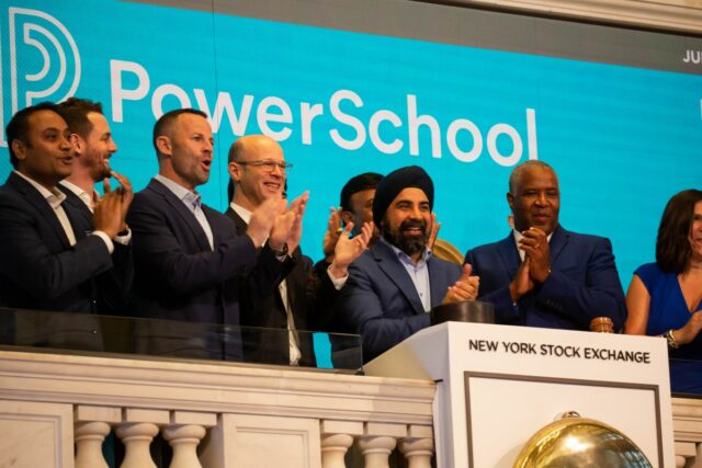 Hardeep Gulati, chief executive officer of PowerSchool, center right, rings the opening bell on the floor of the New York Stock Exchange (NYSE) during the company's initial public offering (IPO) in New York, U.S., on Wednesday, July 28, 2021.