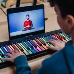 kid playing Roli