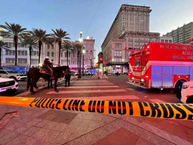 a police cordon at the intersection of canal street and bourbon street in the french quarter of new orleans on jan 1 photo afp