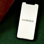 The Substack logo on a smartphone