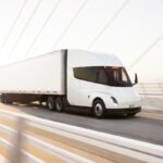 Tesla Semi driving across a bridge