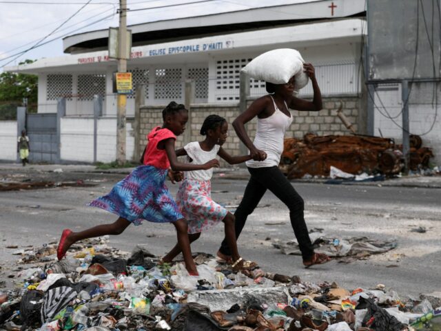 Kinder in Haiti, die Beute für grausame Bande Gewalt fallen, warnt Amnestie

