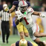 Quinshon Judkins runs with the ball in the 2025 CFP National Championship (Credit: Carmen Mandato/Getty Images)