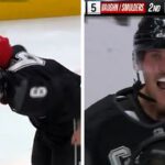 Justin Bieber schlägt spielerisch mit Jeremy Roenick beim Wohltätigkeitshockeyspiel