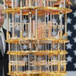 US President Joe Biden looks at a quantum computer