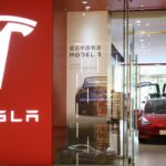 A Tesla Model 3 electric vehicle is displayed for sale at a Tesla showroom on October 12, 2020 in Beijing, China.