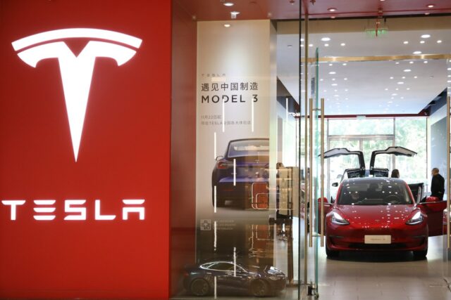 A Tesla Model 3 electric vehicle is displayed for sale at a Tesla showroom on October 12, 2020 in Beijing, China.