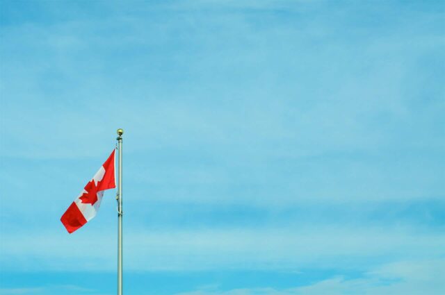 Canadian flag in the sky.