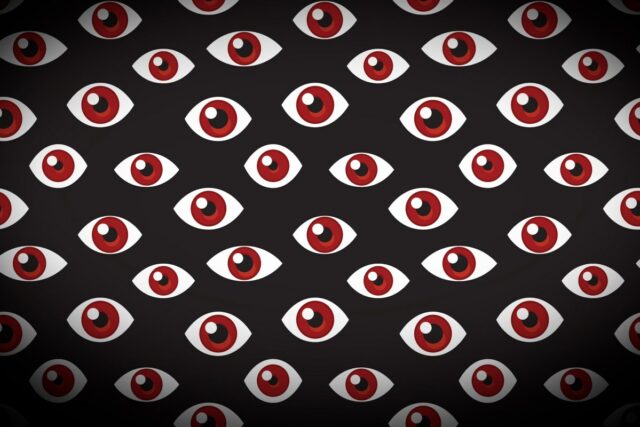 a series of floating eyes on a darkened background